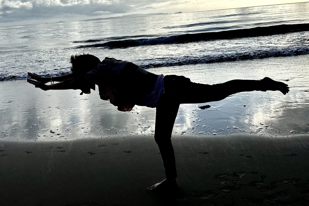 A Scuba Woman doing Yoga on the Beach
Empty Nest Diver